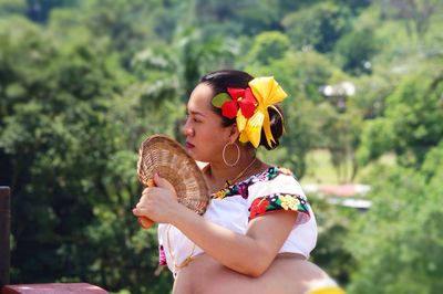 Woman holding flower