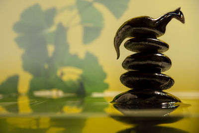 Close-up of stone stack on table