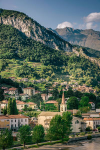 High angle view of houses and mountains against sky