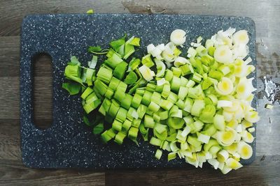 High angle view of chopped vegetables on cutting board