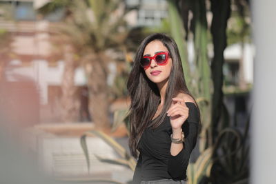 Portrait of woman wearing sunglasses