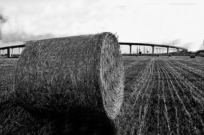 Built structure on field against sky