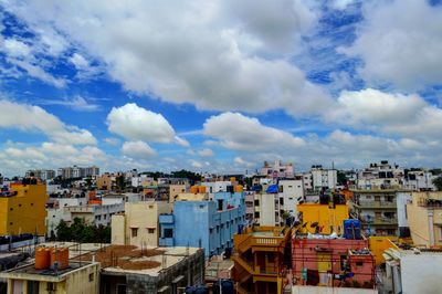 Townscape against cloudy sky