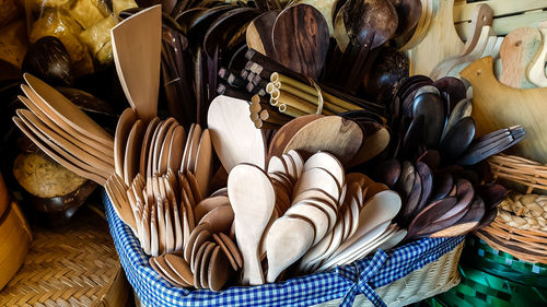 High angle view of wooden kitchen utensils for sale at market