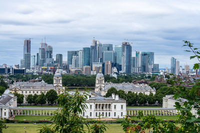 Buildings in city against sky