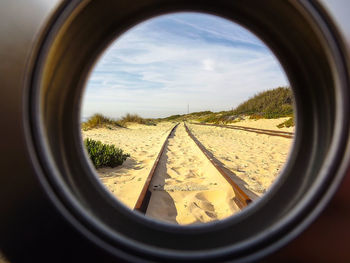 Scenic view of landscape seen through window