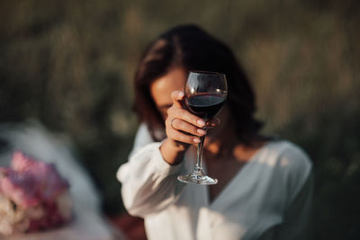 Close-up of a woman drinking glass