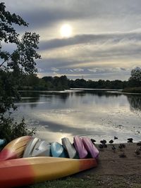 Scenic view of lake against sky during sunset