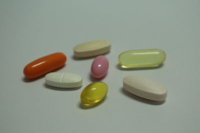 Close-up of multi colored pencils on white background