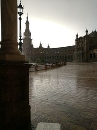 View of historical building in city during rainy season