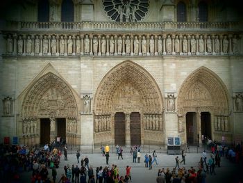 People in front of historical building