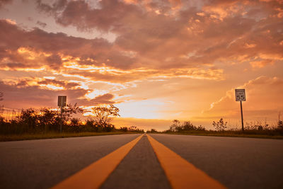 Scenic view of field against sky during sunset