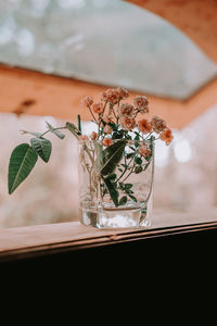 Close-up of glass vase on table