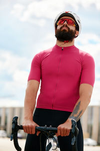 Midsection of man exercising in gym