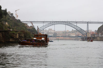 View of bridge over river against sky