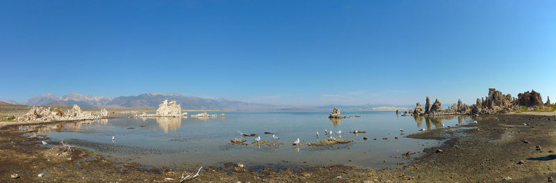 View of sea against clear blue sky