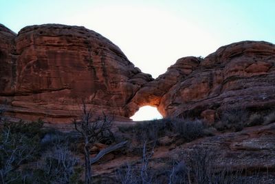 View of rock formation against clear sky