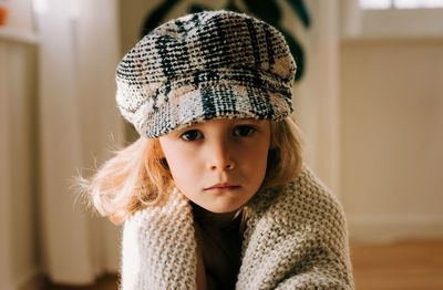 Portrait of cute girl wearing hat