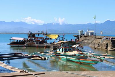 Boats moored in harbor