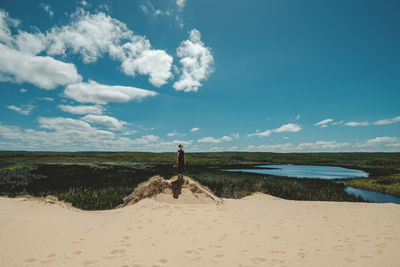 Scenic view of beach against sky