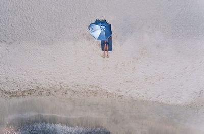 Aerial view of woman on beach