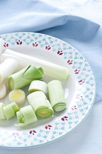 High angle view of vegetables in plate on table