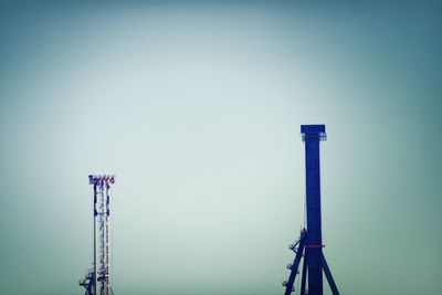 Low angle view of built structure against clear blue sky