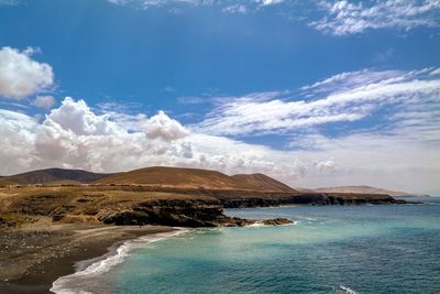 Scenic view of sea and brach against sky