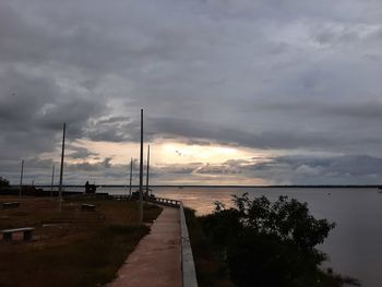 Scenic view of beach against sky during sunset