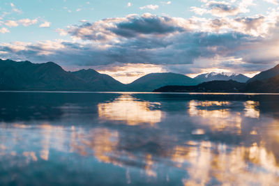 Scenic view of lake against sky during sunset