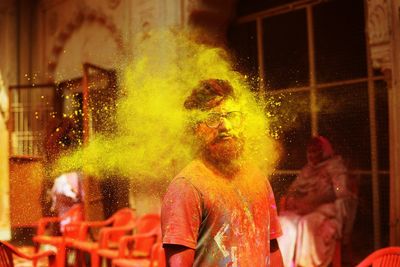Man in powder paint during holi