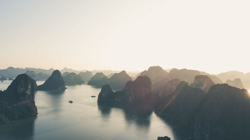 Panoramic view of rocks in mountains against clear sky