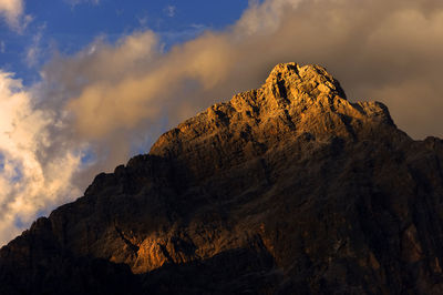 Rocky landscape against clouds