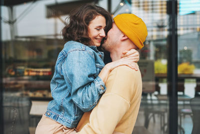 Side view of couple kissing