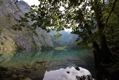 Scenic view of lake by mountains