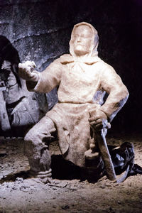 Statue against clear sky at night