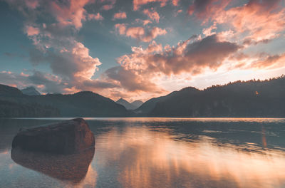 Scenic view of lake against sky during sunset