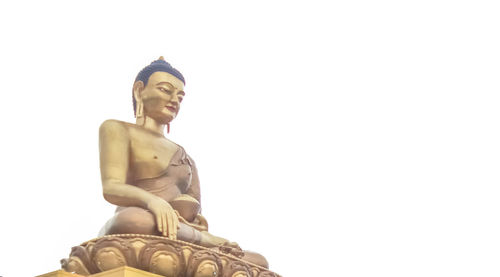 Low angle view of statue against clear sky