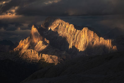 Scenic view of mountains against sky during sunset