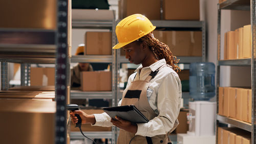 Portrait of young woman standing in gym