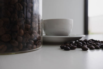 Close-up of coffee beans on table