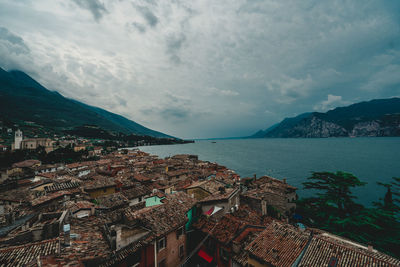 Panoramic view of sea and buildings against sky