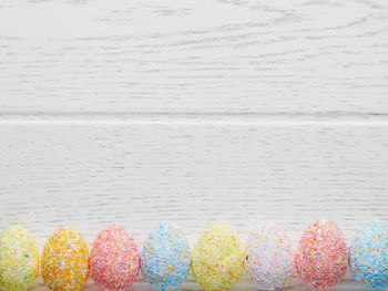 Directly above shot of multi colored candies on table