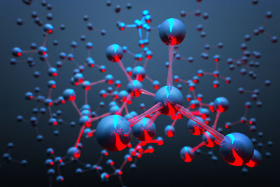 Close-up of molecular structure against blue background