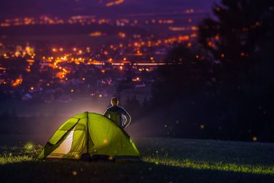 High angle view of tent on field against sky at night