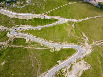 Winding and dangerous road from the high mountain pass in transalpina, romania