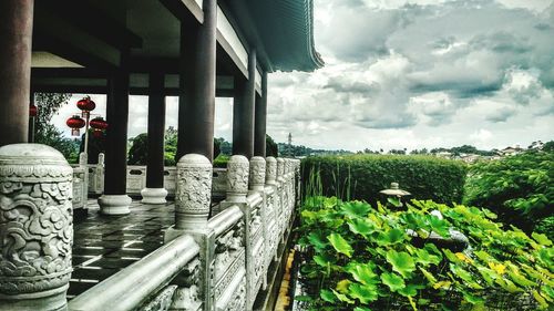 Built structure against cloudy sky