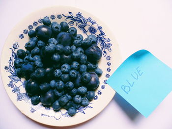 High angle view of fruits in plate on table