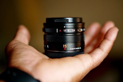 Close-up of hand holding camera