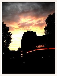 Silhouette of buildings at sunset